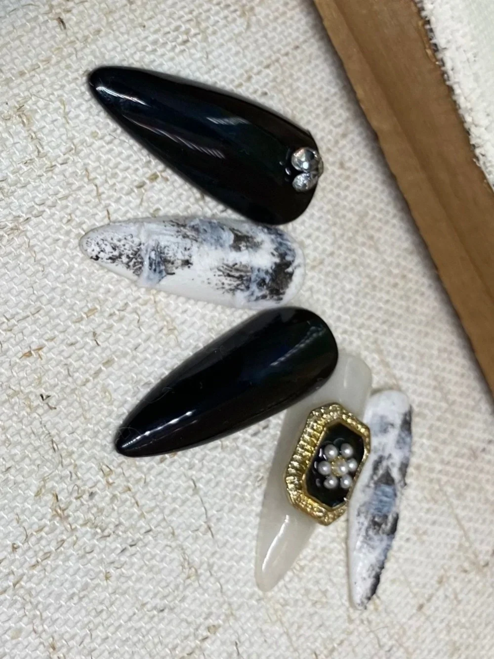 Black & White Marble Press-On Nail Set with Gold and Emerald Accents